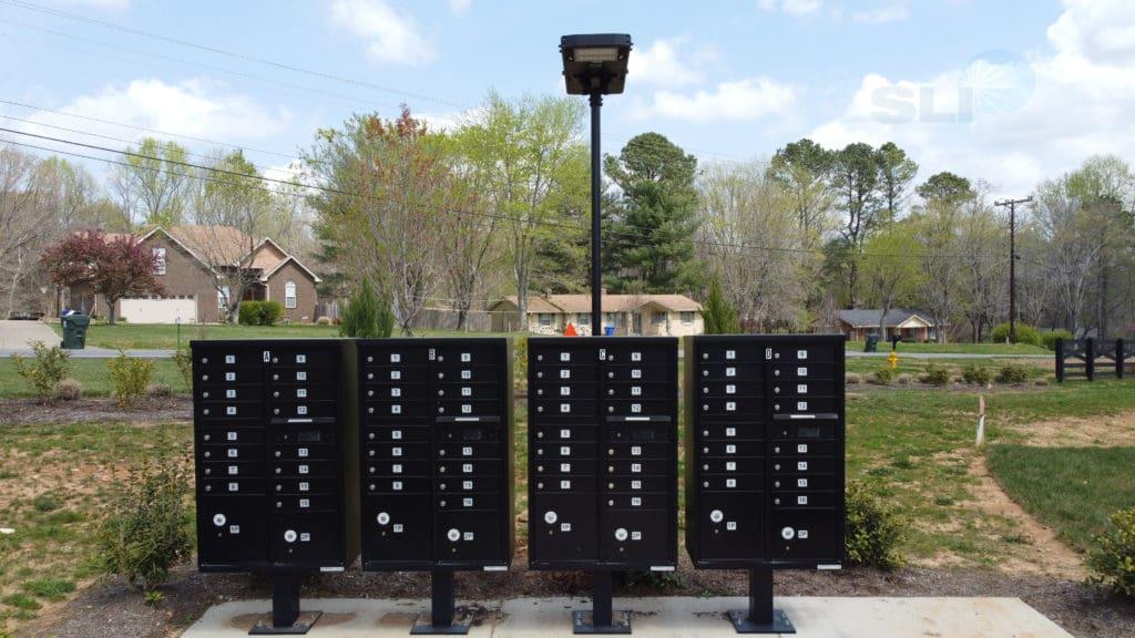 Picture of solar mailbox lighting installed in a community using the stealth 80 all in one solar light
