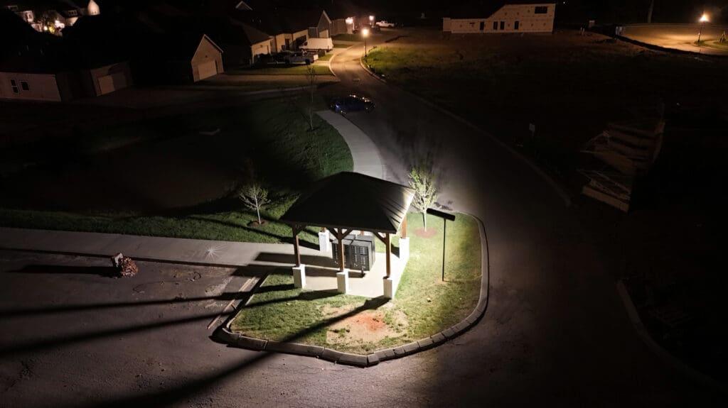 This image portrays a mailbox area in a residential HOA with solar lighting