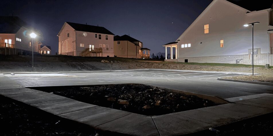 The image portrays a solar lighting solution for a mailbox area in a residential area